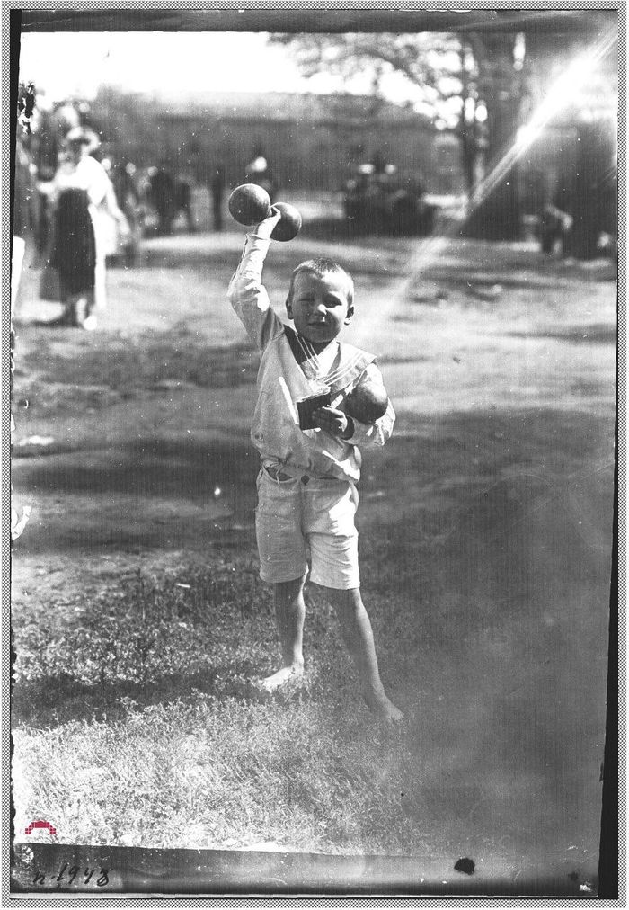 Children's games and sports outside of school. Boy with dumbbells. Petrograd, 1918-1920 - Story, The photo, Health