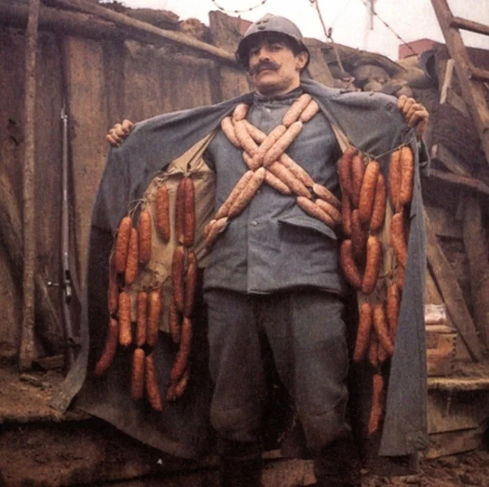 A French soldier with his best German trophies. - Old photo, The soldiers, Sausage, Trophy