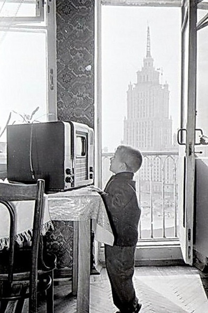 A child looks at a TV that his parents bought for their home. It’s 1956. - TV set, Boy, the USSR, Historical photo