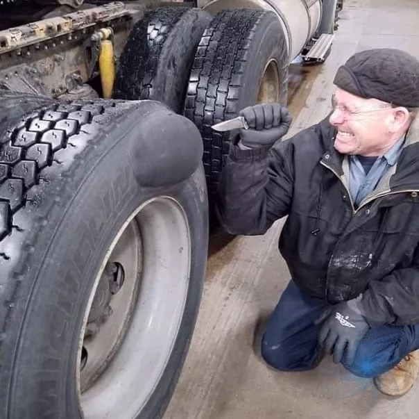 This old man seems to have not yet learned the main lesson of life. - Tires, Hernia, Pressure, Knife, Explosion, Idiocy, Puncture, Car, Truck, Колесо