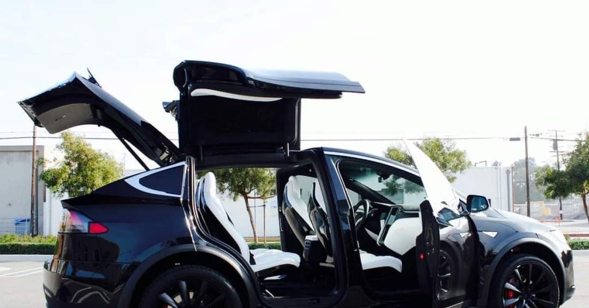 Модель икс. Tesla model x. Тесла модуль Икс. Тесла джип двери. Tesla model x Doors.