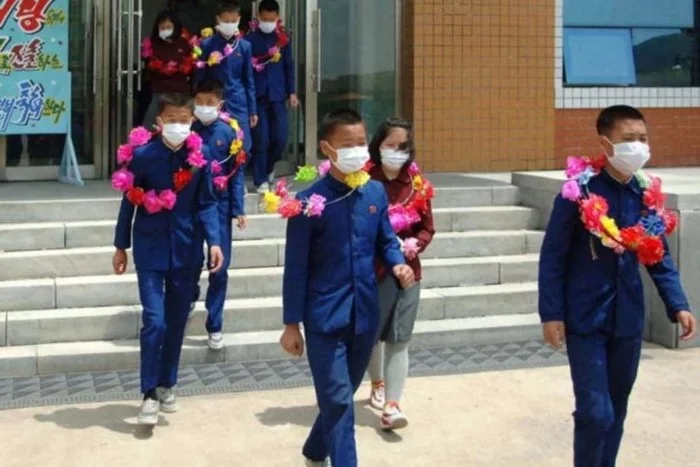 North Korea claims orphans volunteer for hard work - North Korea, Children, Orphans, Volunteers, Economy