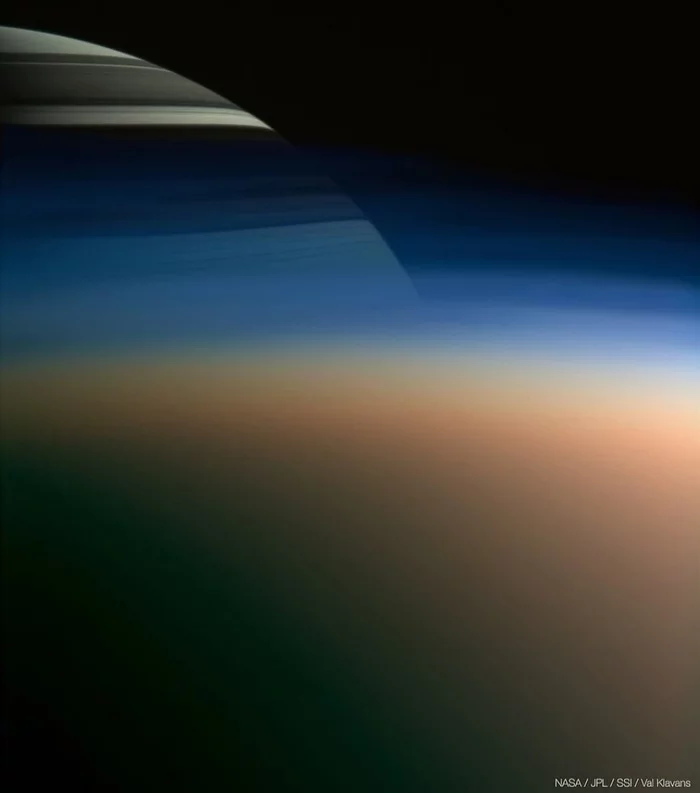 An image of Saturn peeking out of the dense atmosphere of its largest moon, Titan - The photo, Saturn, Titanium, Cassini, Space exploration