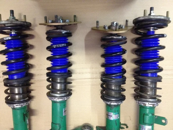 Elements of automobile suspensions, elastic elements and shock absorbers. - My, Suspension, Spring, GIF, Longpost, Hydropneumatic suspension