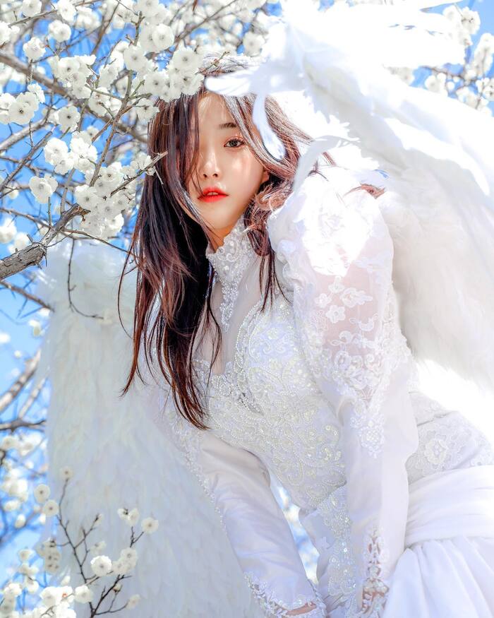 Angel floating in the white clouds , , , 