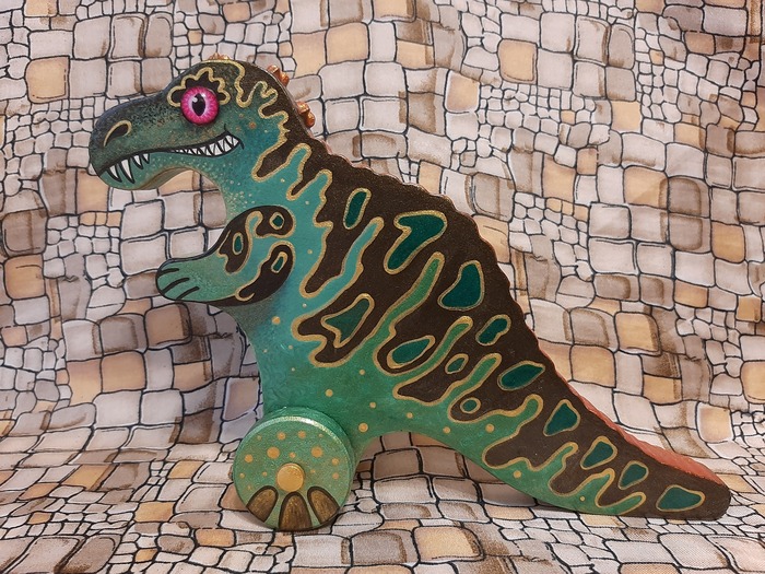 Деревянная игрушка на колёсиках "Аллозавр"