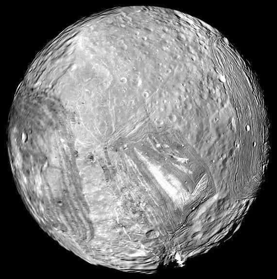 This is Miranda, the smallest of the five major moons of Uranus. - Planet, Universe, Astronomy, Milky Way, Galaxy, Stars, Uranus, moon, Space, Land