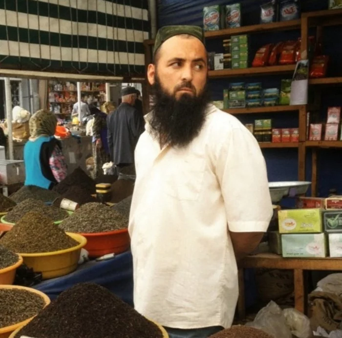 Bearded Uyghur at a market in Hotan - Uyghurs, Beard