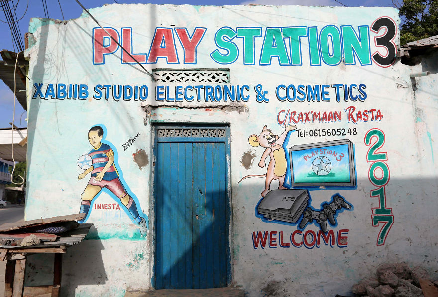 In Somalia, shop fronts are painted in such a way that illiterate residents can easily understand what they are selling there. - My, Somalia, Longpost, Street art, Artist