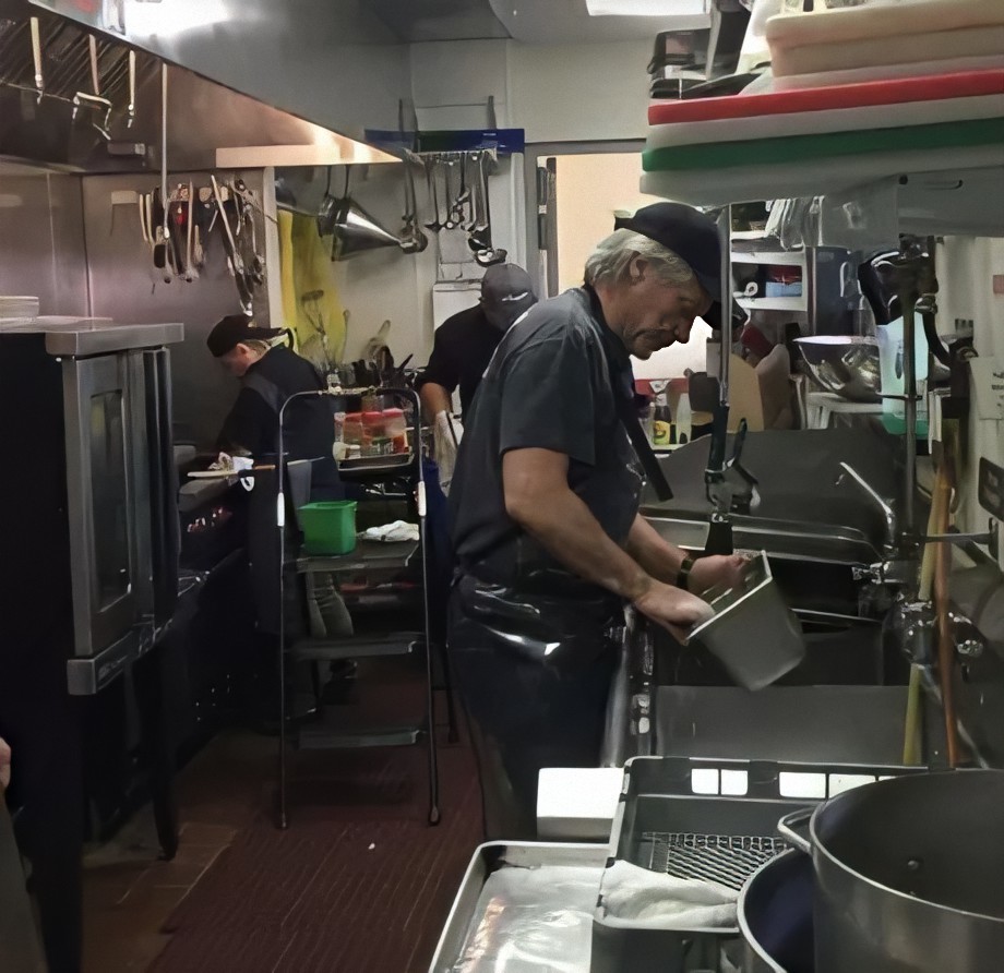 The photo shows famous singer Jon Bon Jovi working side by side with his employees amid the current situation with the COVID-19 virus - Jon Bon Jovi, Help, Coronavirus, Dishwashing