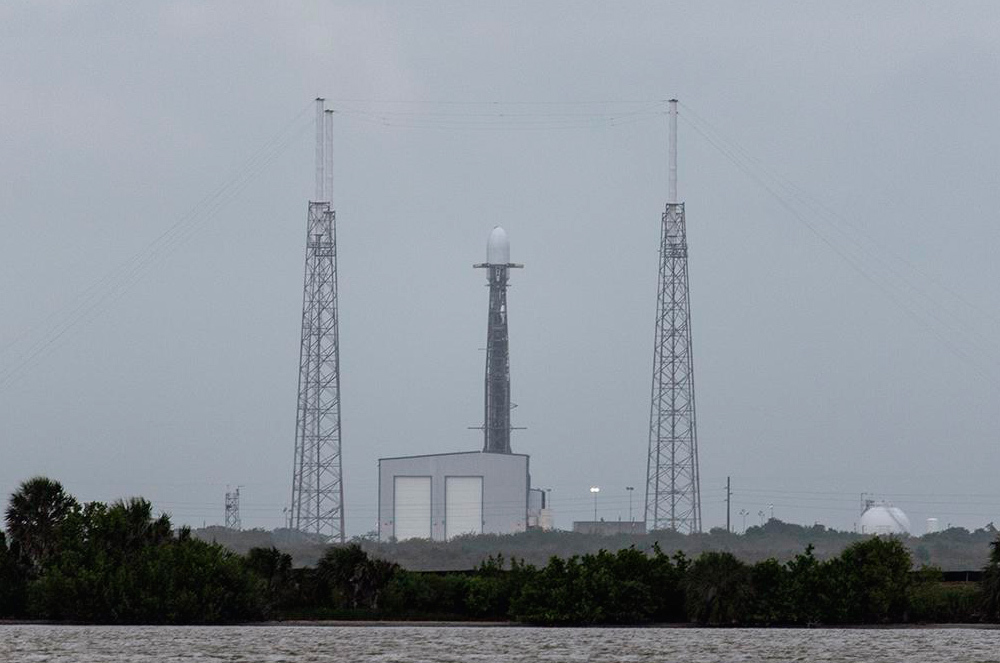 Atlas V and Falcon 9 at their launch pads at Cape Canaveral awaiting launch - Booster Rocket, Running, Cape Canaveral, Cosmonautics, Atlas V, Falcon 9
