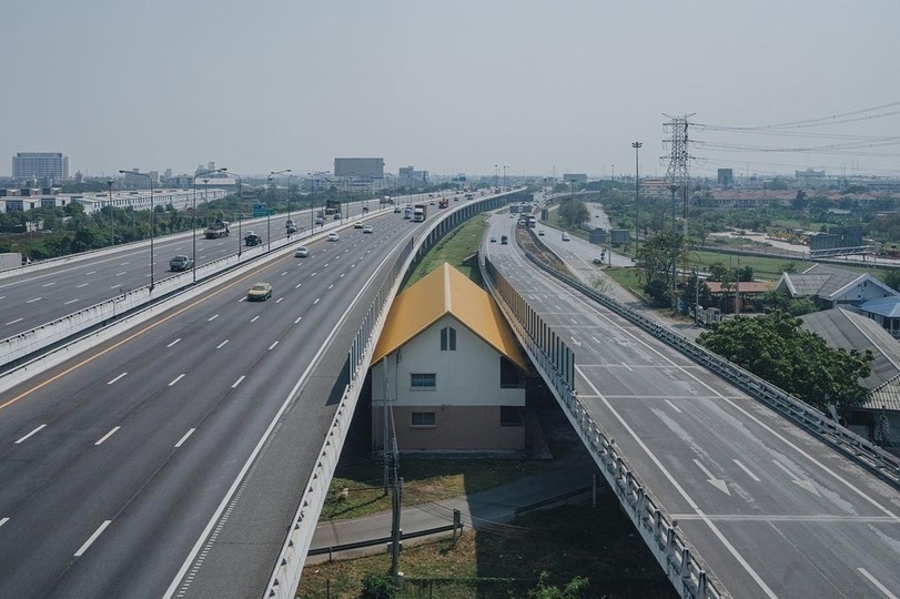 A family in Bangkok refused to sell their house, and the city had to design the highway for a small hindrance. - Bangkok, House, Highway, The photo