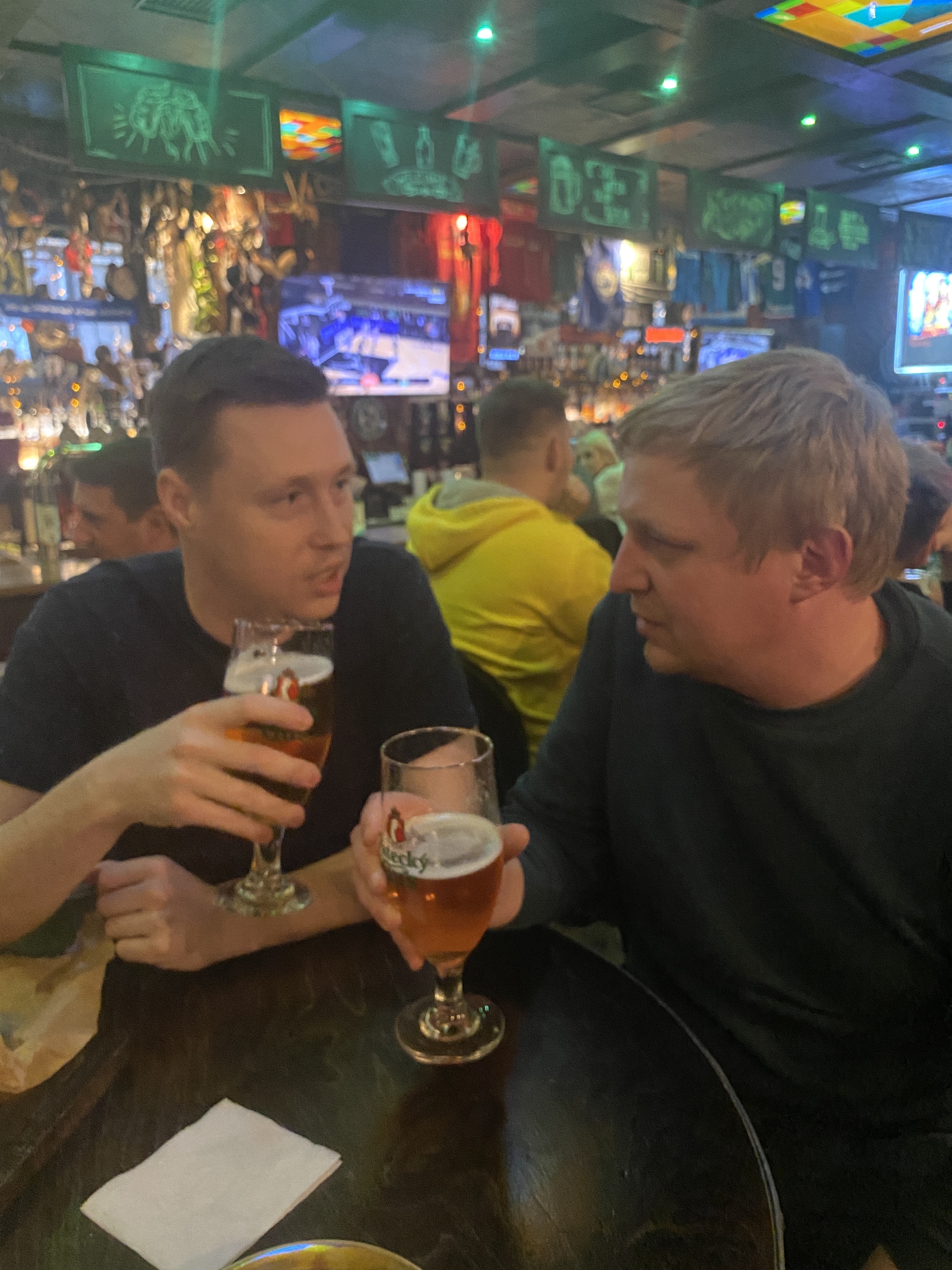 Father and son drink beer at the bar. Guess which one is who? - Family, Alcohol, Bar