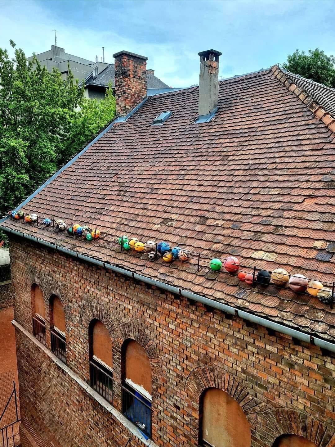 The roof of the house next to the school - House, Roof, Ball, School