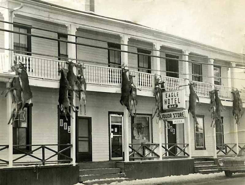 The Eagle Hotel in Downsville, New York during deer season. 1960s - USA, Black humor, Historical photo