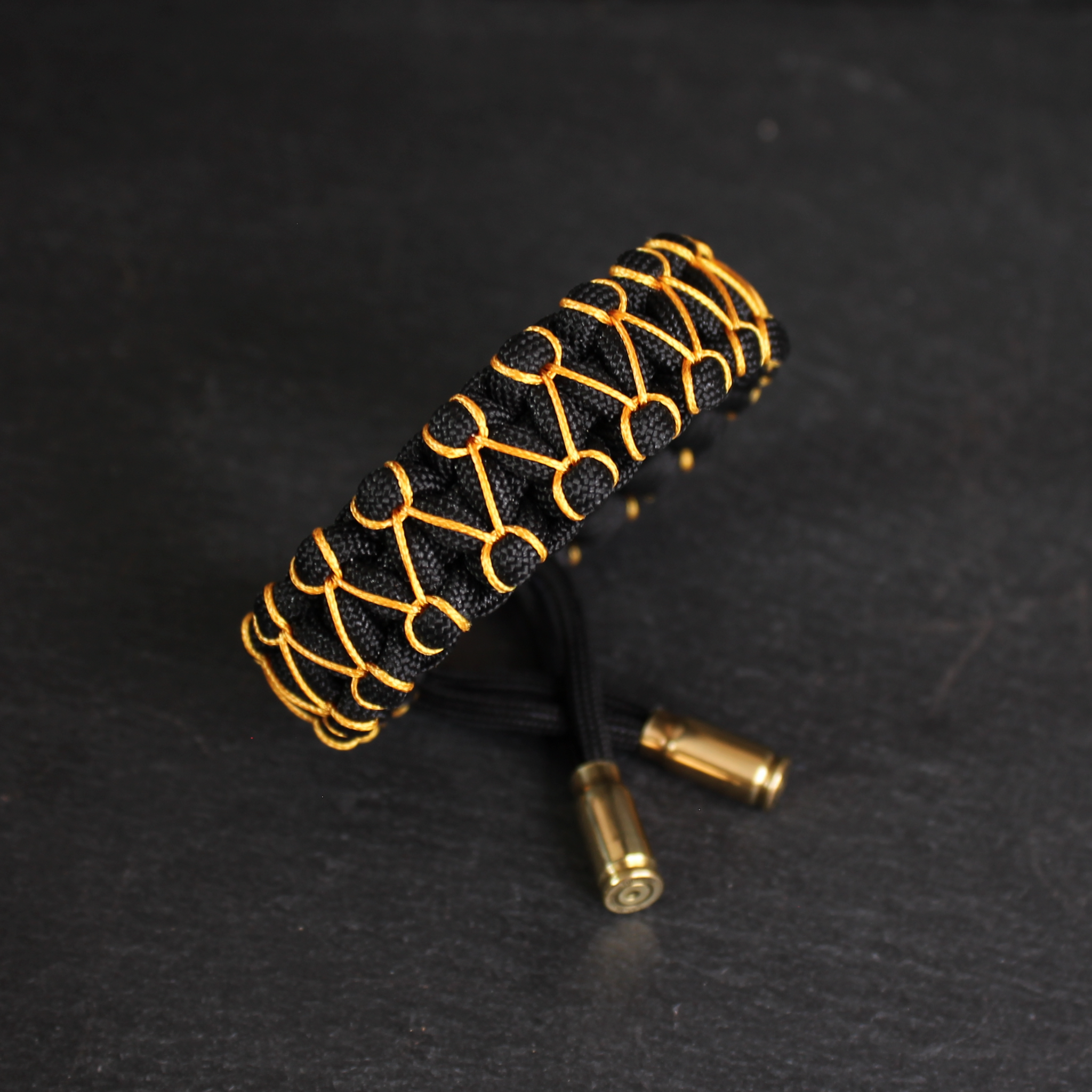 Bracelets with gun cases, part 3 - My, Handmade, Needlework without process, Hobby, With your own hands, Longpost, Accessories, Weapon casings, Decoration, Cartridges, A bracelet, Paracord, Friday tag is mine, Weaving, Caliber