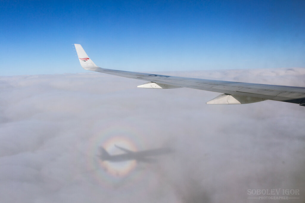 Reply to the post Rare natural phenomenon - My, Nature, Person, The rocks, The mountains, Clouds, Phenomenon, Rainbow, Reply to post, View from the plane, Airplane